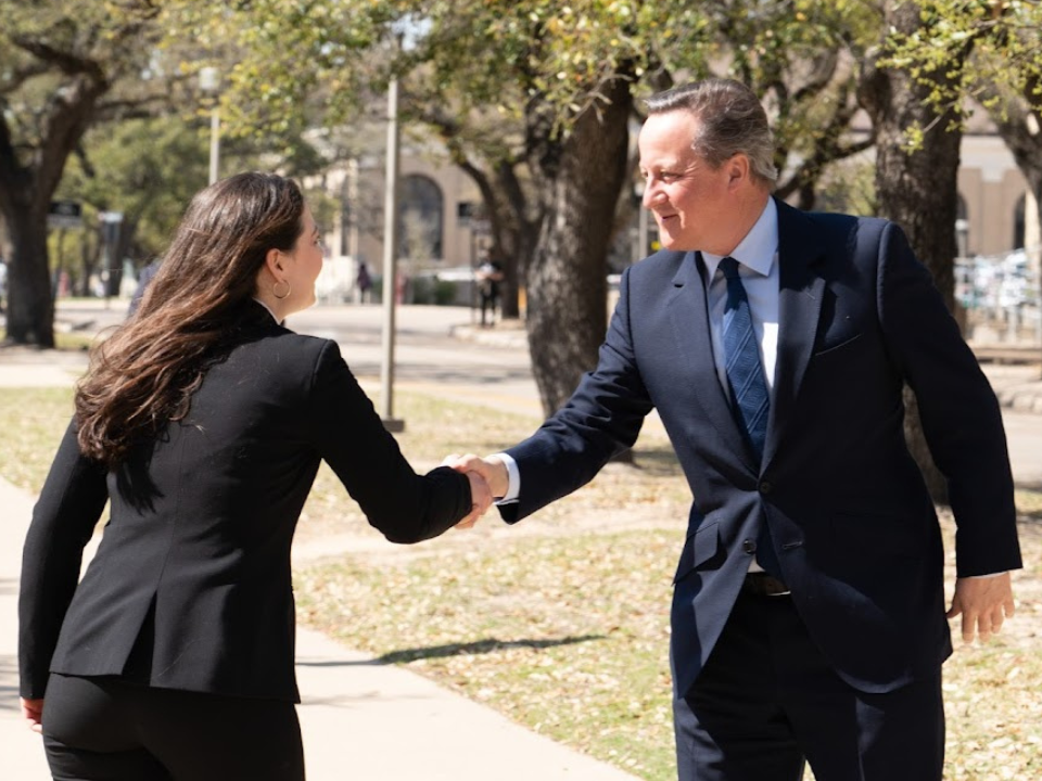 An MSC Wiley member shaking hands with a man outdoors
